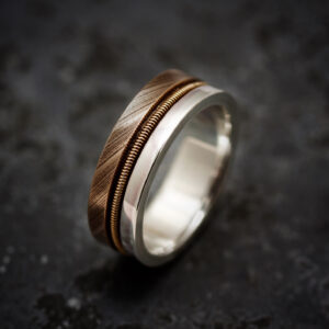 Brett Eldredge – Sterling Silver/Cymbal Bronze Ring with Bronze Strings £250