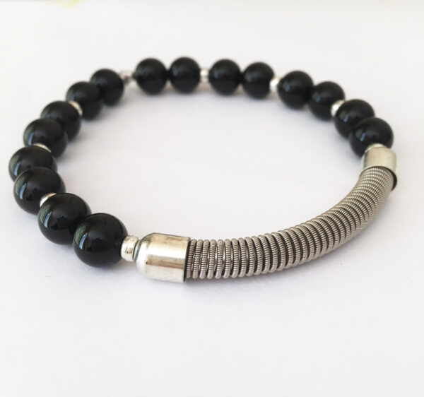 Noel Gallagher – “Riff” guitar string Bracelet £125